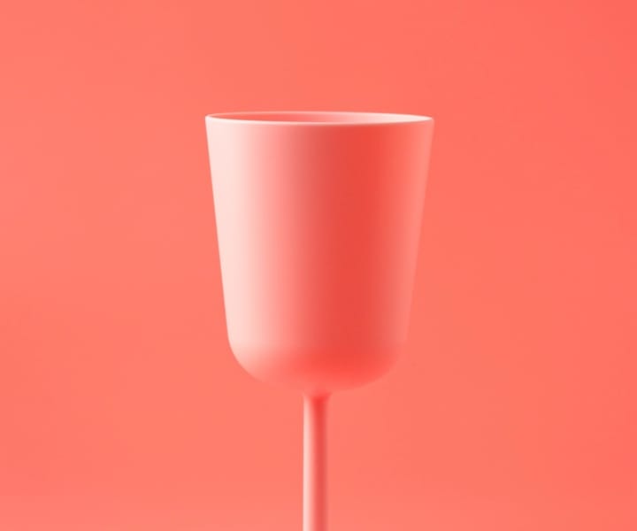 Pink glass on coral background